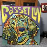 mosaic portrait propped against a cabinet, title "Basset Luv"